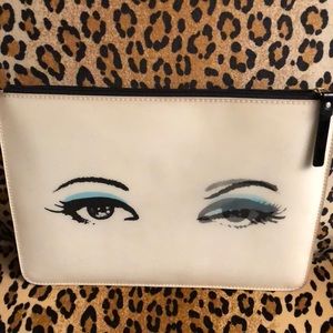 Kate Spade thin clutch that winks back!